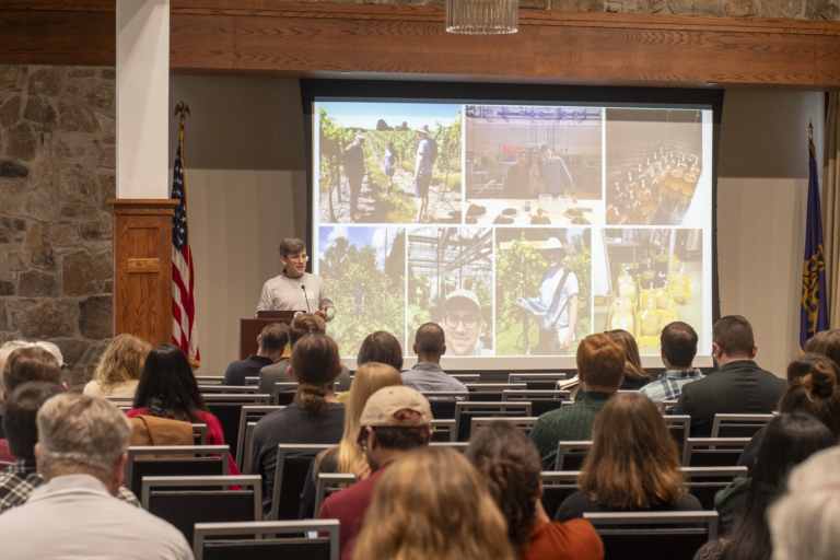 Dr. Drew Harner presenting at the 2026 Invasive Species Research Symposium